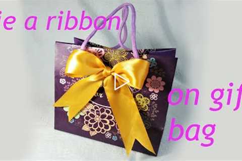 How to make a bow | ribbon bow | bow making | tie a ribbon on gift bag #giftbag