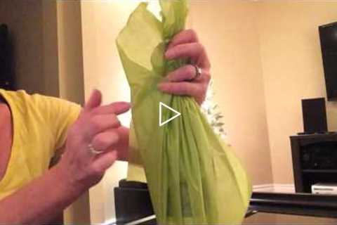 How to pleat tissue when wrapping a wine bottle